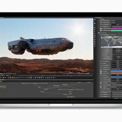 A MacBook Pro screen shows a graphics artist’s workflow.