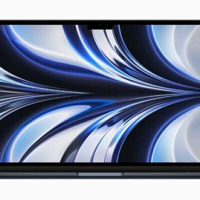 MacBook Air in midnight displaying a wallpaper.  