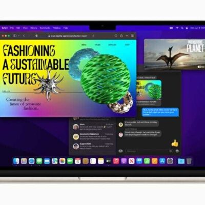 MacBook Air in starlight showcasing M2 running multiple applications.  