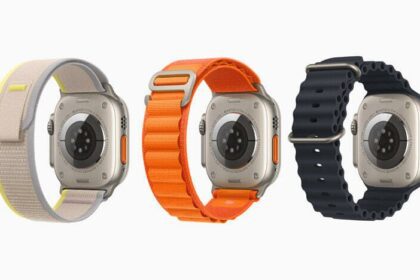 Three Apple Watch Ultra devices are shown from behind to feature their three different bands, including a gray-and-yellow Trail Loop, orange Alpine Loop, and black Ocean Band.
