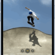 Camera in Photo mode, with other modes to the left and right below the view finder. Buttons for Flash, Camera Controls, and Live Photo appear at the top of the screen. The Photo and Video Viewer button is in the bottom-left corner. The Take Picture button is at the bottom center, and the Camera Chooser Back-Facing button is in the bottom-right corner.  