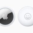 Front and back view of AirTag personalised with a smiley-face emoji.  