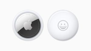 Front and back view of AirTag personalised with a smiley-face emoji.  