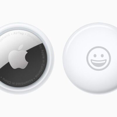 Front and back view of AirTag personalised with a smiley-face emoji.  