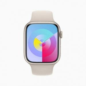 Apple Watch Series 8 shows the new Palette watch face in iris.
