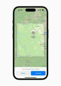 An iPhone 14 Pro user is prompted to download a specific area within Maps so they can access navigation and other features offline.