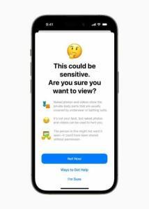 The Sensitive Content Warning feature warns an iPhone 14 Pro user that the content they’ve received could be sensitive and asks, “Are you sure you want to view?”