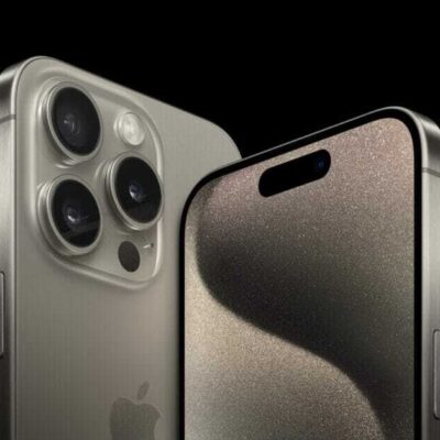 The iPhone 15 Pro and iPhone 15 Pro Max in the natural titanium finish.