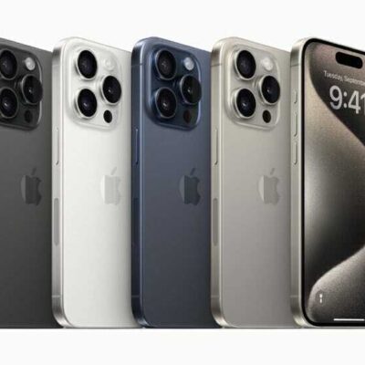 iPhone 15 Pro in black titanium, white titanium, blue titanium, and natural titanium finishes.