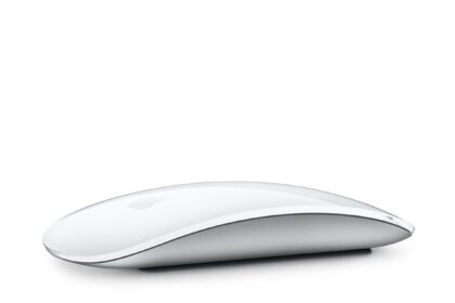 Magic Mouse in White, showing its curved design and Multi-Touch Surface.  