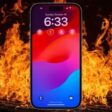iPhone with fire in the background