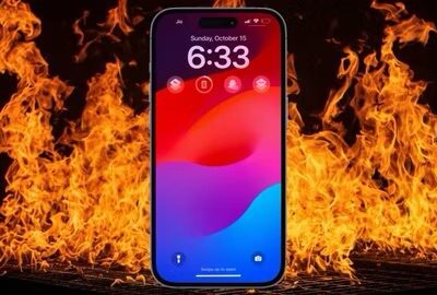 iPhone with fire in the background