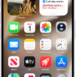 An iPhone Home Screen, showing a live Voice Memo recording in the Dynamic Island at the top of the screen.