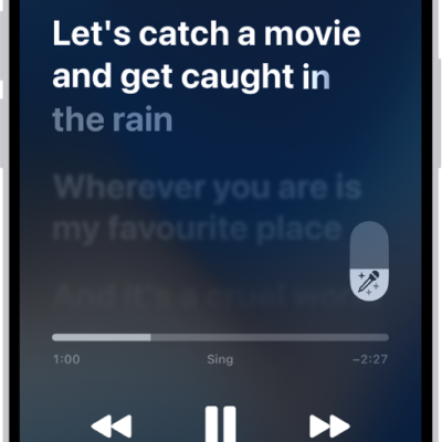 The Now Playing screen showing the Apple Music Sing slider to the right of the lyrics. The currently playing lyrics are highlighted.
