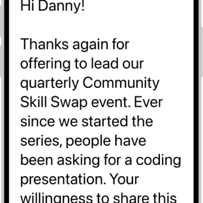 An iPhone with the Mail app open. An email is displayed with large, bold text.