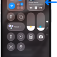 The iPhone Control Center showing an arrow pointing to the audio card where you can control music from the Lock Screen or when using another app.
