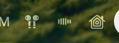 The top-right part of Control Center on Apple TV 4K. AirPods appear to the right of the time.