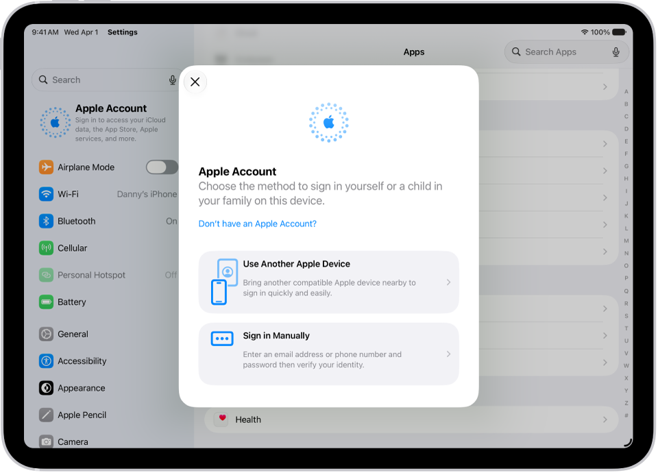 The Settings app, with the Apple Account sign-in dialog in the middle of the screen.