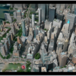 A 3D map in the Maps app, showing a city.