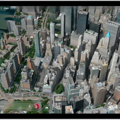 A 3D map in the Maps app, showing a city.
