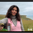 A FaceTime video call in progress, showing one participant at the bottom left. An image of three other participants fills the rest of the screen. At the bottom right are the Camera, Microphone, More, and End Call buttons.