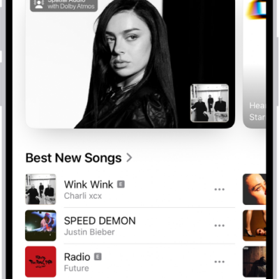 The New tab showing a new album at the top. You can swipe left to see more featured music and videos. The Best New Songs section appears below. You can swipe up on the screen to explore new and recommended music.