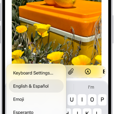 The Keyboard Settings menu is open, and shows multiple keyboard options: English & Spanish, Emoji, and Keyboard Feedback.