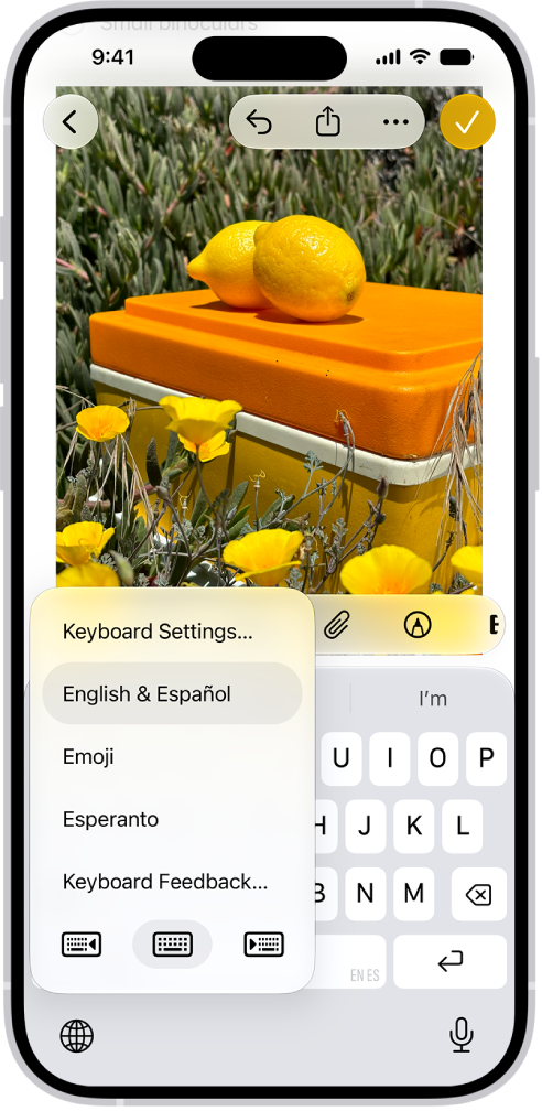 The Keyboard Settings menu is open, and shows multiple keyboard options: English & Spanish, Emoji, and Keyboard Feedback.