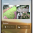The Home tab showing, from top to bottom, four categories, two scenes, three camera views, and the status of one room. Across the bottom are the tabs Home (which is selected), Automation, and Discover.