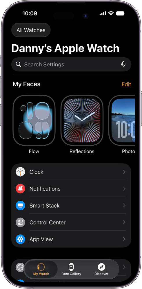 The Apple Watch app on iPhone open to the My Watch screen, which shows your watch faces near the top and settings below. There are three tabs at the bottom of the Apple Watch app screen: the left tab is My Watch, where you go for Apple Watch settings; next is the Face Gallery, where you can explore available watch faces and complications; then Discover, where you can learn more about Apple Watch.