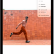 Preview app window showing a photo with a hand holding grapes in the foreground. The background of the photo shows the sky and the ocean.