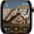 The Home app screen showing four camera views. Along the bottom are buttons for climate controls, lighting accessories, and locks.