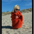 A slideshow in the Photos app plays on an iPad. At the top right of the screen is a pop-up menu, with an option to choose AirPlay.