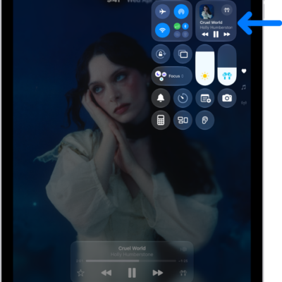 The iPad Control Center showing an arrow pointing to the audio card where you can control music from the Lock Screen or when using another app.