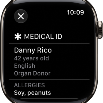 The Medical ID screen showing the person's name, age, language, organ donor status, and emergency contacts.