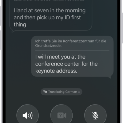 A phone call in the Phone app showing a conversation translated from German to English.