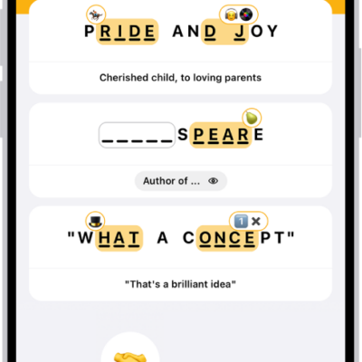 The Emoji Game, showing the number of moves, two emoji placed as answers, and one about to be placed in an unanswered spot.