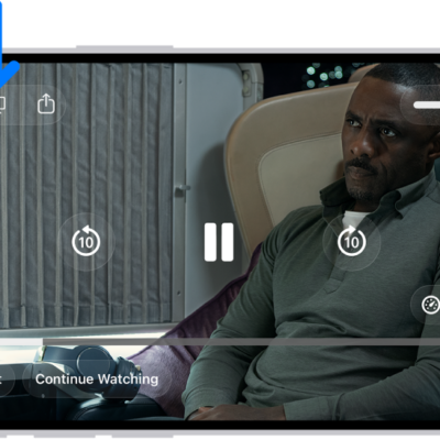 A movie playing on the iPhone screen. In the middle of the screen are the playback controls. The AirPlay button is near the top left.