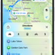 An iPhone showing a map with several driving route options to the same destination. Each route shows the estimated time and distance, and a Go button to start turn-by-turn directions. Color coding on each route indicates traffic conditions.