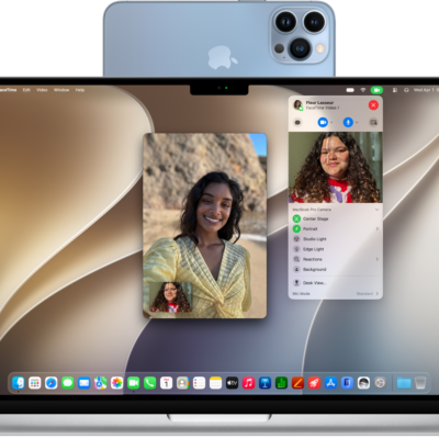 A MacBook Pro using an iPhone as a webcam and showing a FaceTime conversation.