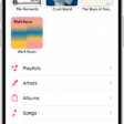 The Library tab showing a list of categories including Playlists, Artists, Albums, Songs, and Downloaded. The Recently Added heading appears below the list. The MiniPlayer showing the title of the current song and the Pause and Next buttons appear near the bottom.