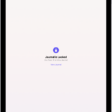 A screen in the Journal app that prompts you to use Touch ID to unlock your journal.