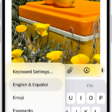 The Keyboard Settings menu is open, and shows three options: English (US), Emoji, and Keyboard Feedback. At the bottom of the menu, from left to right, are buttons for left-handed layout, default layout, and right-handed layout. The default layout button is selected.