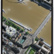 A 3D map in the Maps app, showing details of a city.