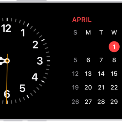 iPhone turned horizontally. The left side of the screen displays a clock and the right side of the screen displays the date.