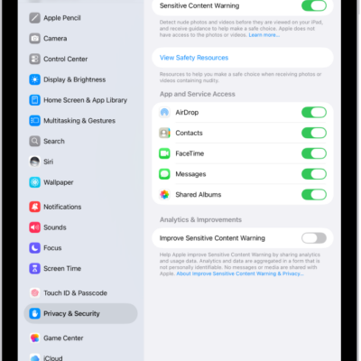 The settings for Sensitive Content Warning, with a button labeled View Safety Resources and a button labeled Improve Sensitive Content Warning for sharing analytics and usage data with Apple.