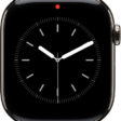 A red dot at the top center of the watch face, indicating unread notifications.