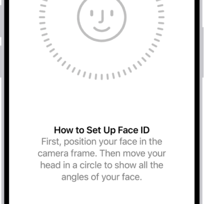 The Face ID recognition setup screen. A smiley face is showing on the screen, enclosed in a circle. Text below instructs the user to move their head slowly to complete the circle. A button for Get Started appears near the bottom of the screen.