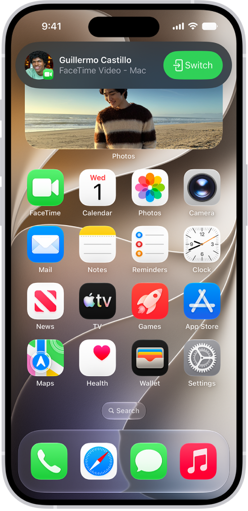 The iPhone Home Screen showing a FaceTime video call notification from an iPad at the top. Tap the Switch button to the right of the notification to move the call to your iPhone