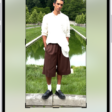 The Edit screen with a photo in the center. At the bottom of the screen, from left to right, are the Portrait, Adjust, Filters, Crop, and Clean Up buttons. The Crop button is selected and there is a slider to adjust the geometry enhancements.